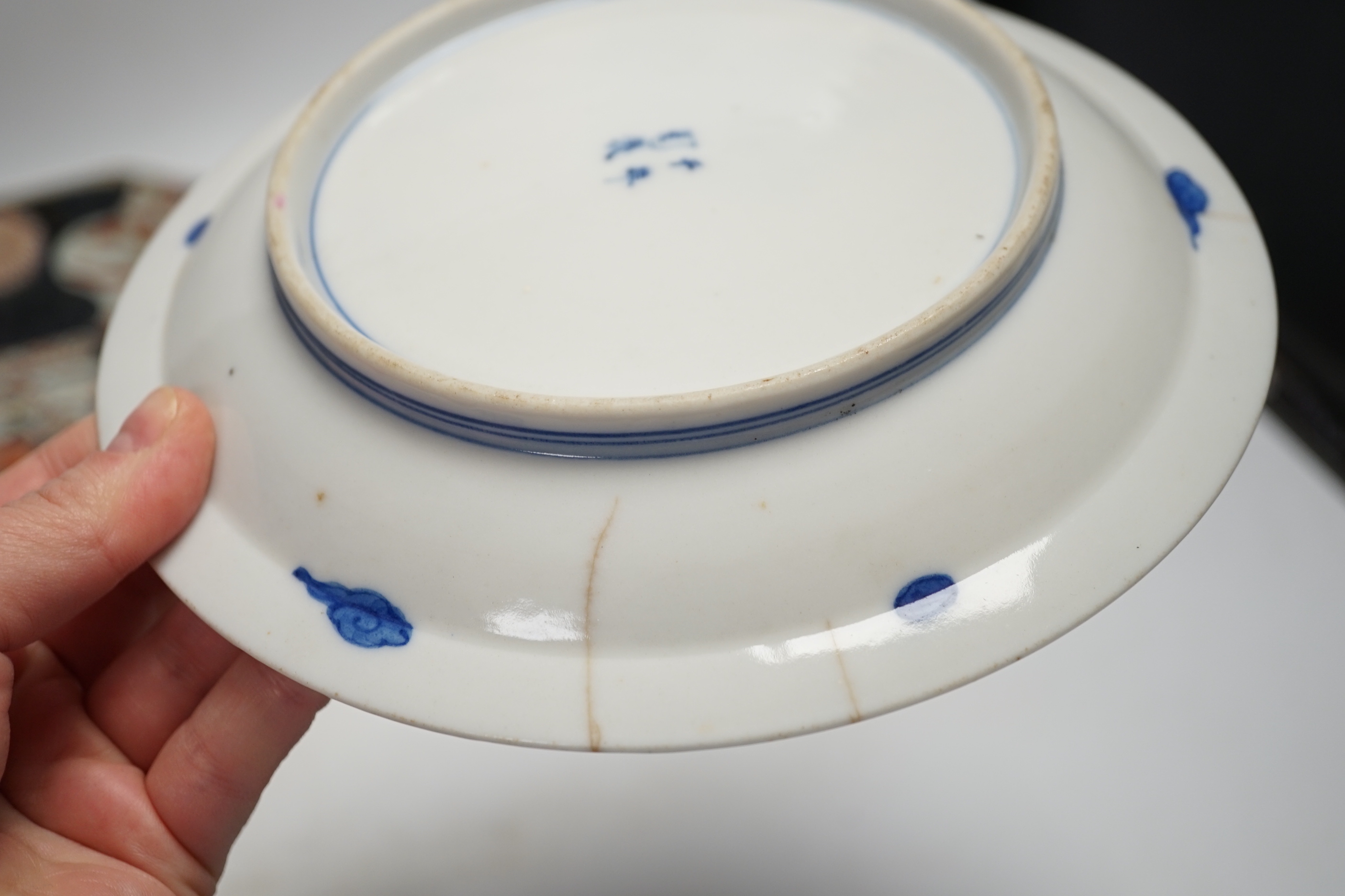 A late 17th/early 18th century Japanese Arita dish (a.f) and two other Arita pieces, largest 27cm